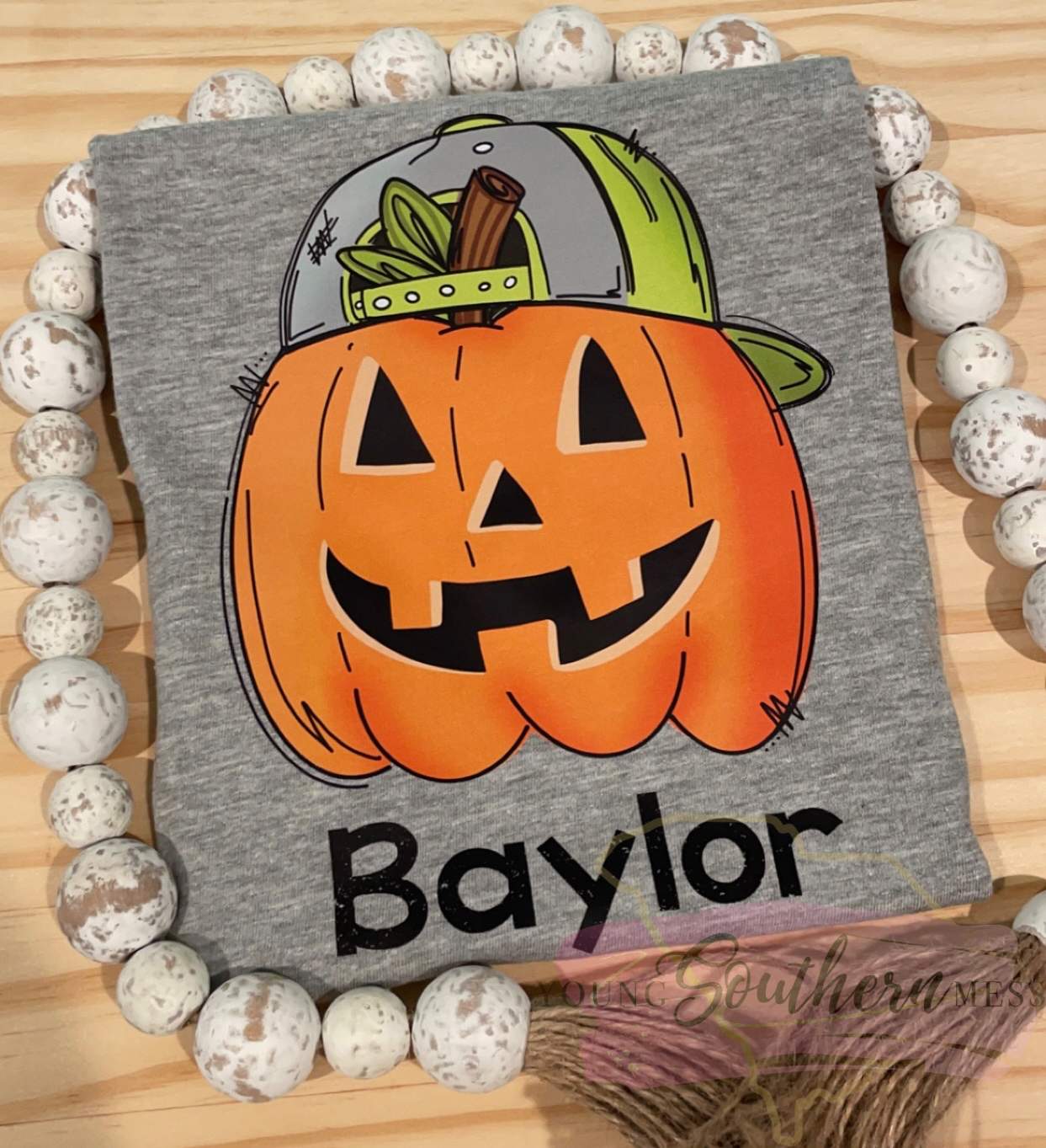 cool pumpkin shirt with backwards hat
