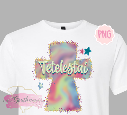 White t-shirt with colorful design and 'Tetelestai' text on a gray background